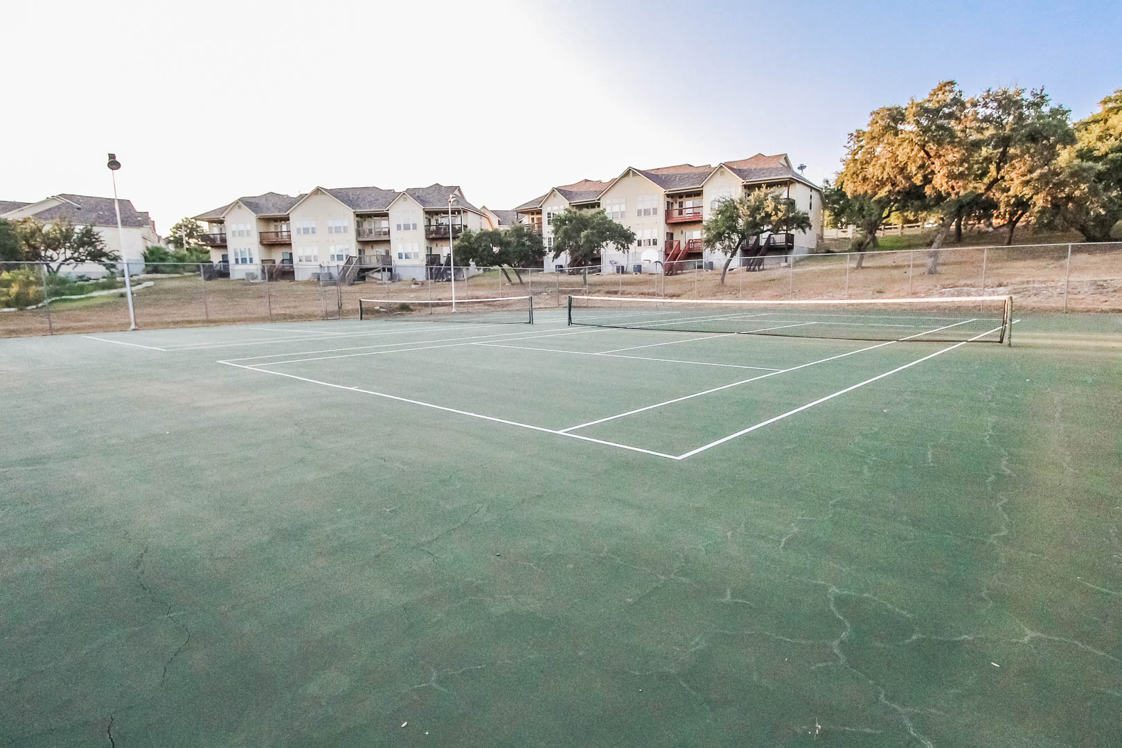 An inviting tennis court at VRI's Vacation Village at Lake Travis in Texas.